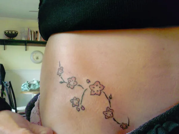 Real community tattoo placement: Kara - Blossoms