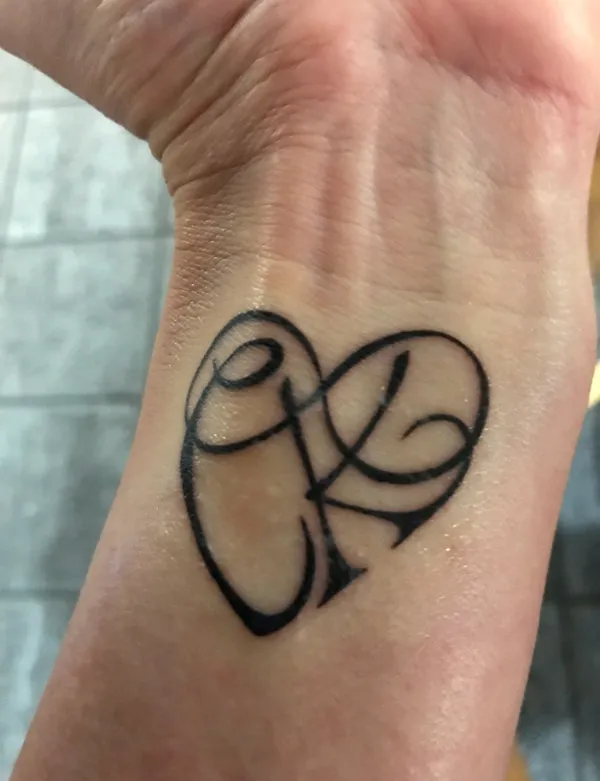 Real community tattoo placement: Keileen - C+K heart