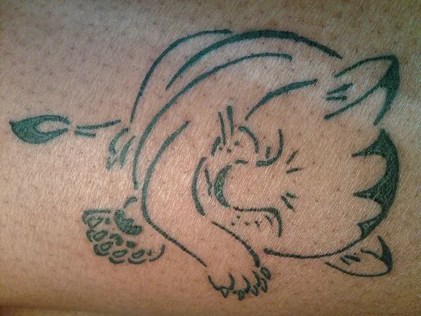 Real community tattoo placement: Kenya - Sleeping lion cub
