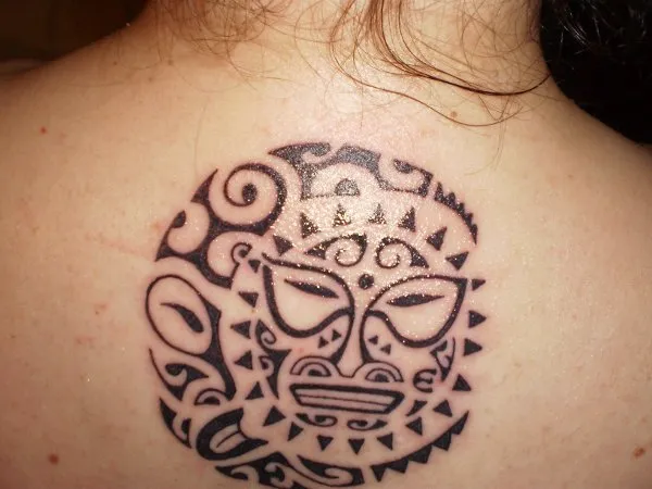 Real community tattoo placement: Lia - Maori sun-moon