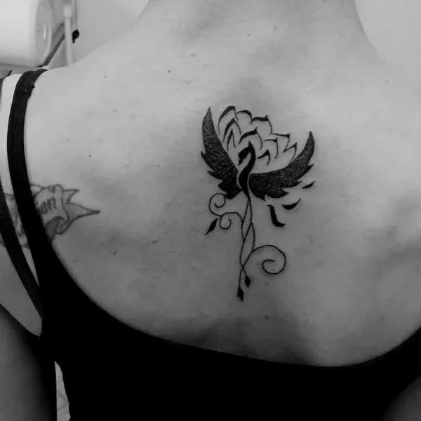 Real community tattoo placement: Lilly - phoenix & lotus