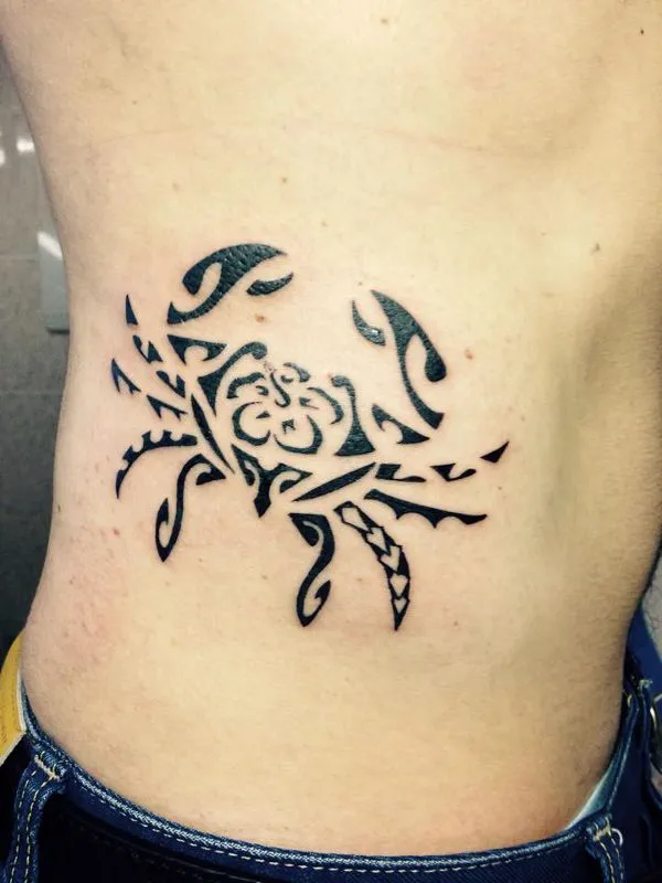 Real community tattoo placement: Lorenzo - crab