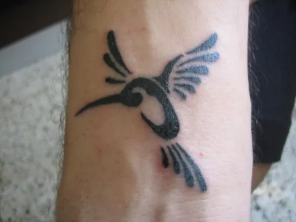 Real community tattoo placement: Luca - Humming bird