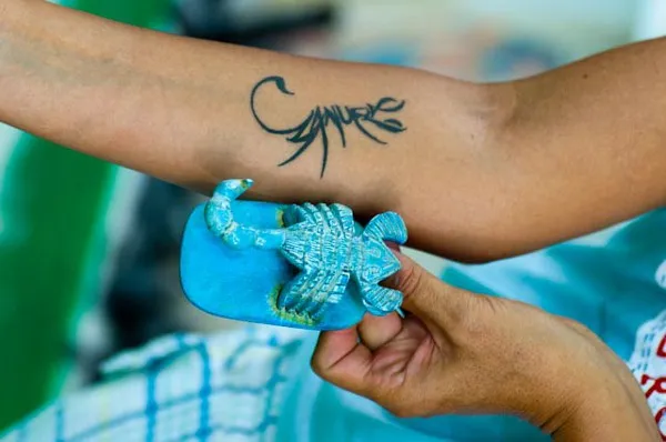 Real community tattoo placement: Manuela - Scorpion