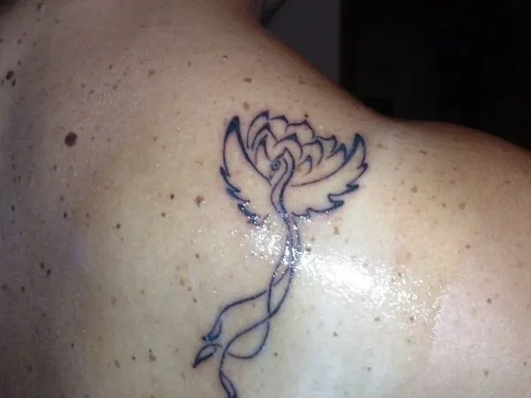 Real community tattoo placement: Marta - Phoenix and lotus