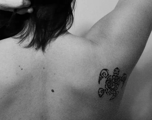 Real community tattoo placement: Martina - Flowers turtle