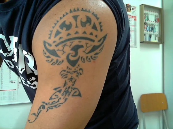 Real community tattoo placement: Maurizio - Polynesian mix