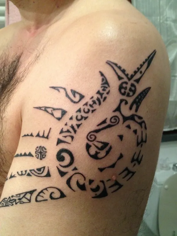 Real community tattoo placement: Mauro - Spiraling sun
