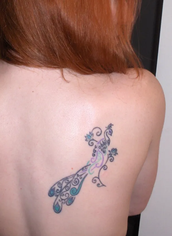 Real community tattoo placement: Megan - Peacock & lotus