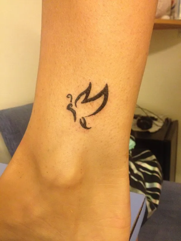 Real community tattoo placement: Milly - M butterfly