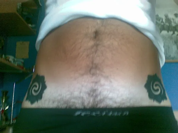 Real community tattoo placement: Mirko - Borneo rosettes