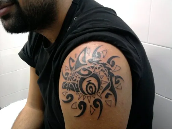 Real community tattoo placement: Mirko - Sun and eye