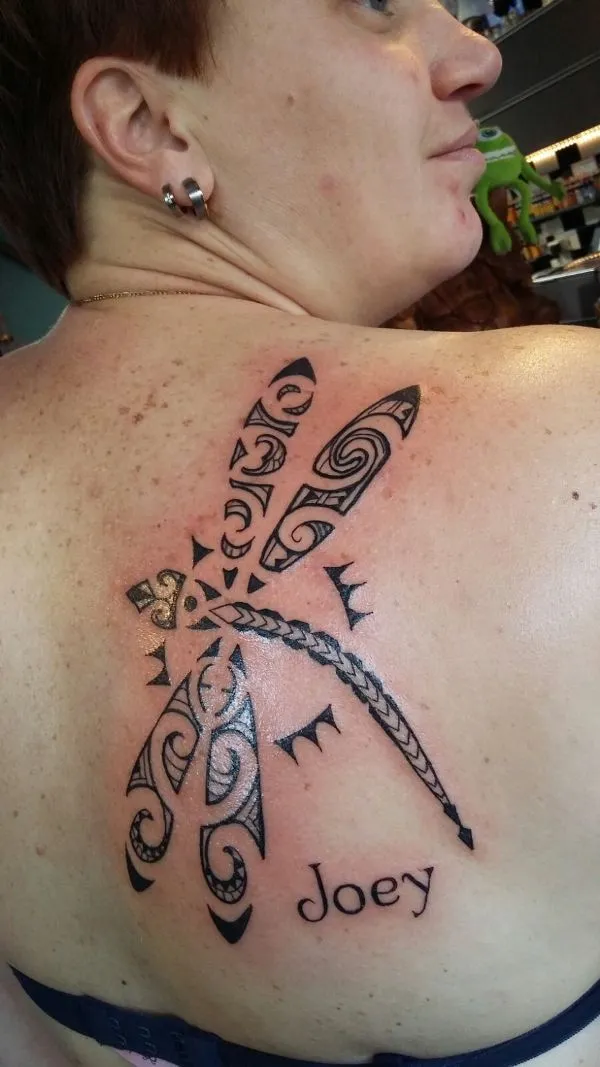 Real community tattoo placement: Natascha - JMP dragonfly