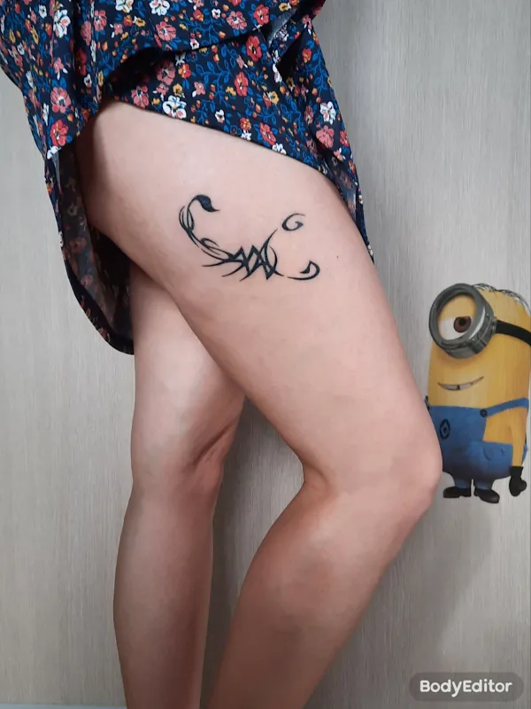 Real community tattoo placement: Oksana - Scorpion