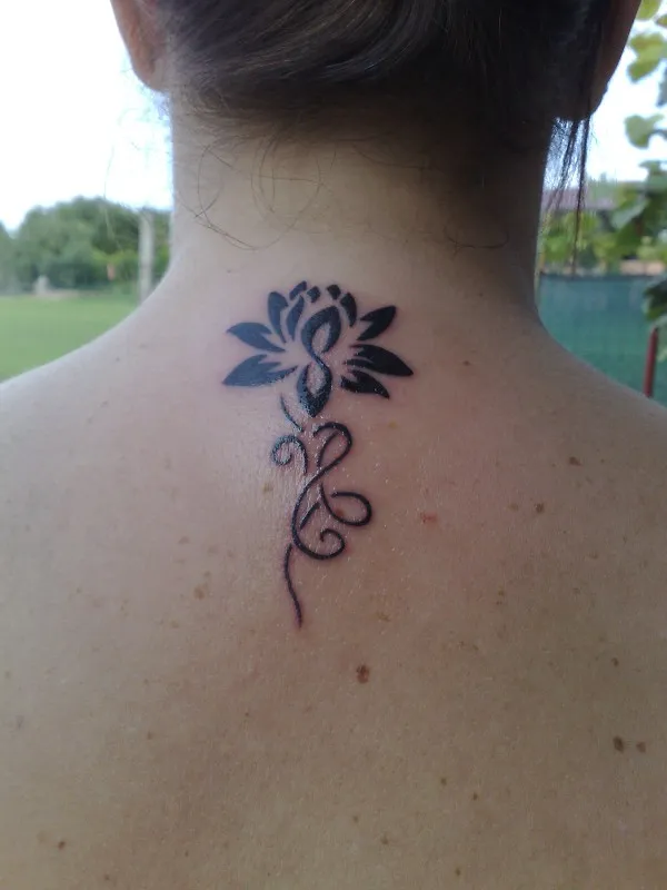 Real community tattoo placement: Ombretta - Lotus flower