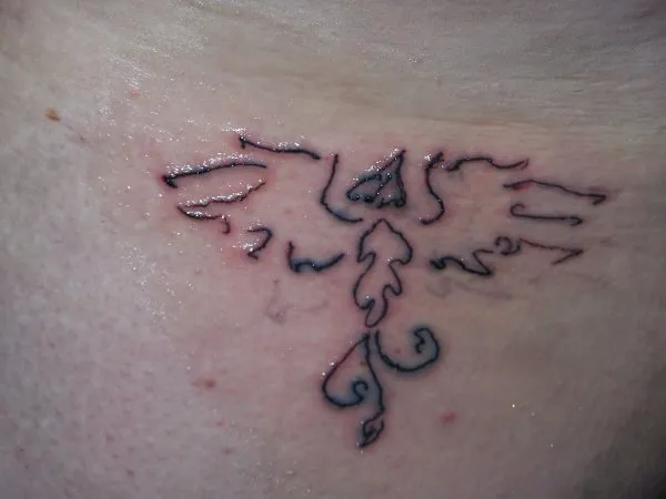 Real community tattoo placement: Paul - Stylized phoenix