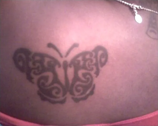 Real community tattoo placement: Phonia - Tribal butterfly