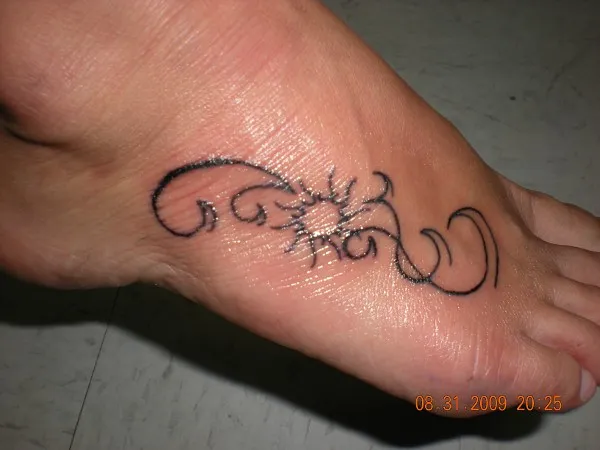 Real community tattoo placement: Rachel - Sun & waves