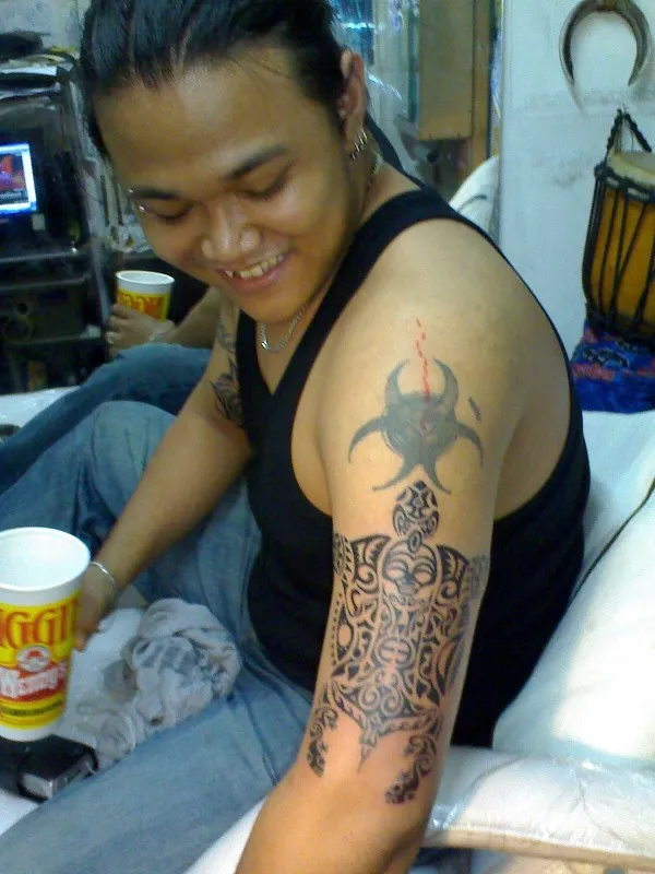 Real community tattoo placement: Red - Kaumoana