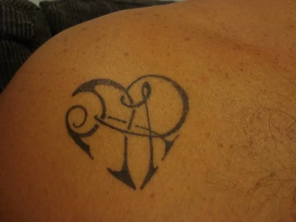 Real community tattoo placement: Rodney - A+R heart