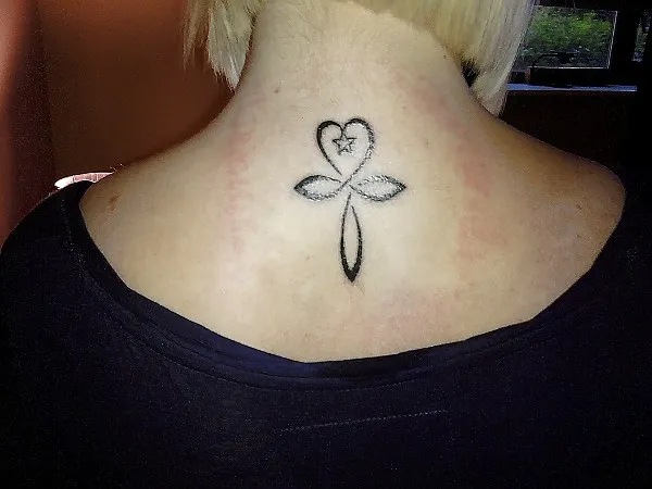 Real community tattoo placement: Samantha - Ankh heart