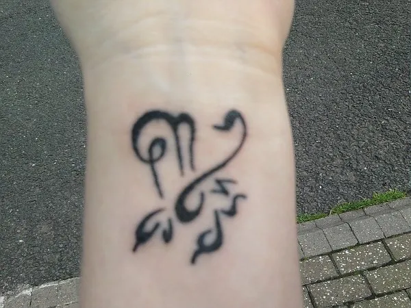 Real community tattoo placement: Samantha - Scorpio