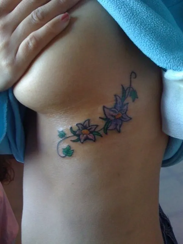 Real community tattoo placement: Sara - Ivy and flowers