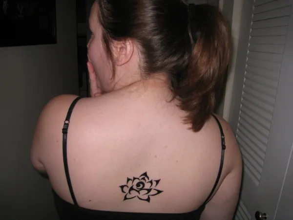 Real community tattoo placement: Sarah - lotus