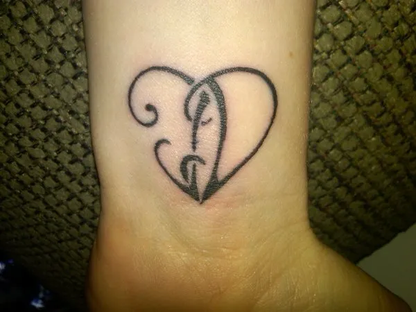 Real community tattoo placement: Shawna - J+D heart