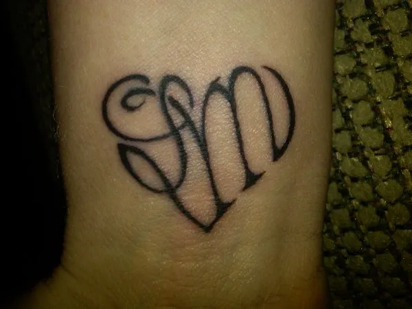 Real community tattoo placement: Shawna - L+M heart