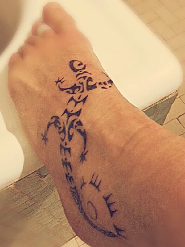 Real community tattoo placement: Silvia - Lizard sun