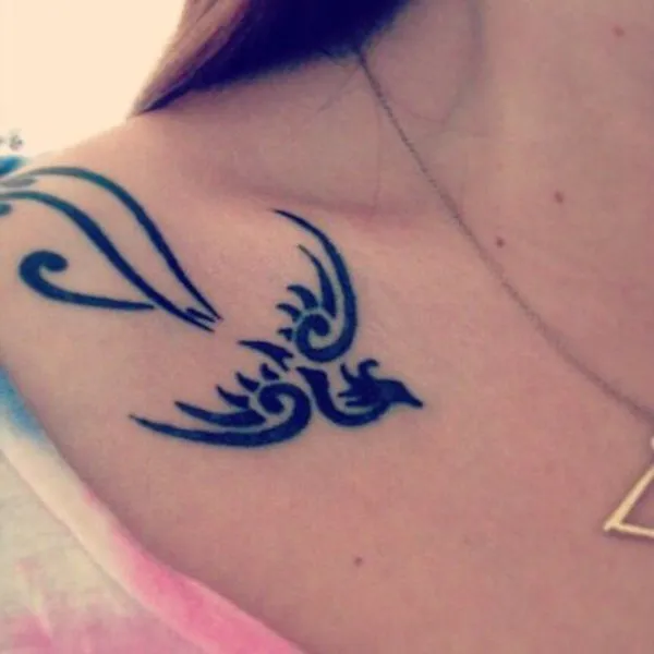 Real community tattoo placement: Sonya - small phoenix