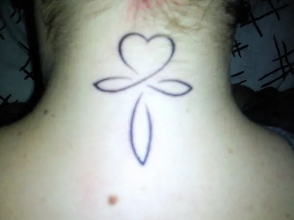 Real community tattoo placement: Sophie - Ankh and heart