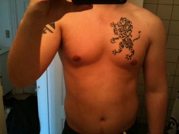 Real community tattoo placement: Thomas - Rampant lion
