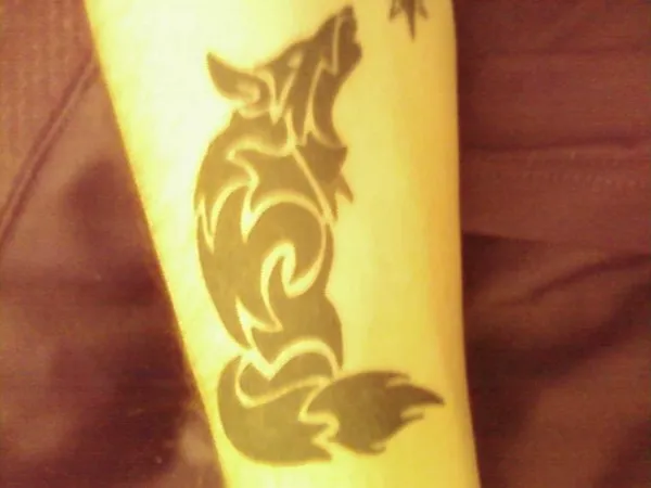 Real community tattoo placement: Tiocfaidh Ar La - Wolf
