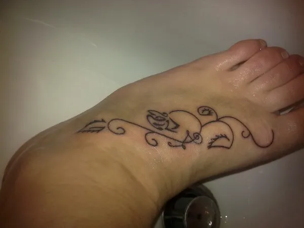 Real community tattoo placement: Valentina - Thornless rose