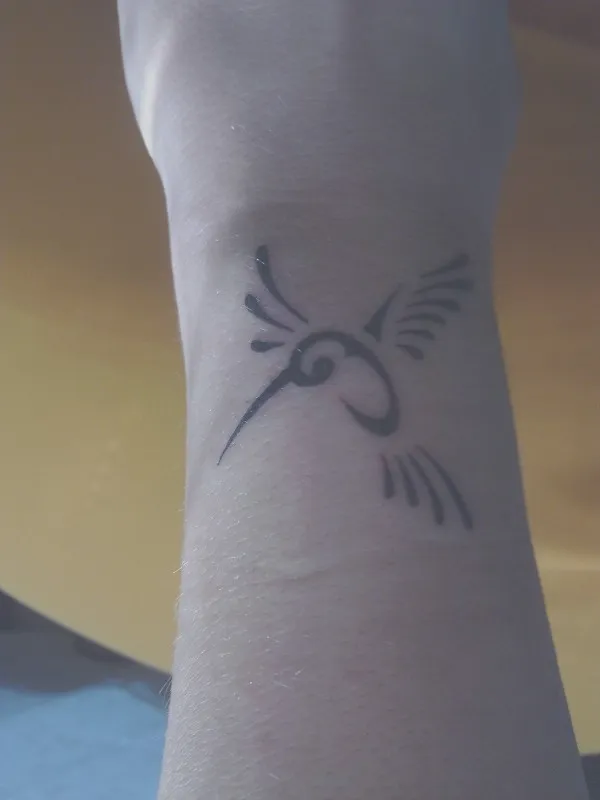 Real community tattoo placement: Valeria - Humming bird