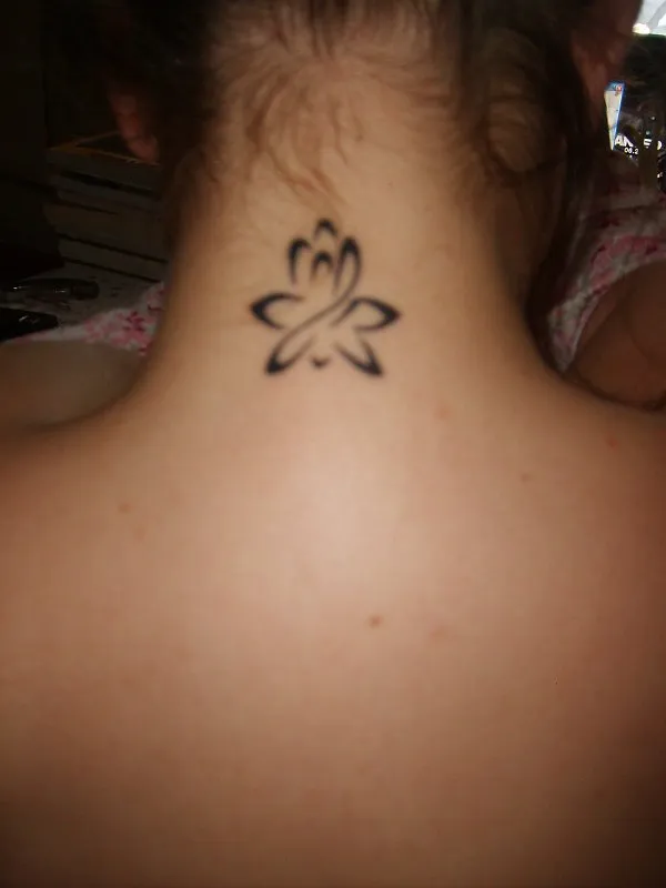 Real community tattoo placement: Vicky - Lotus & B