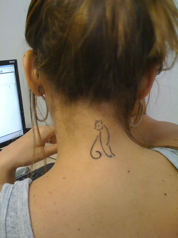 Real community tattoo placement: Sabrina - Stylized cat