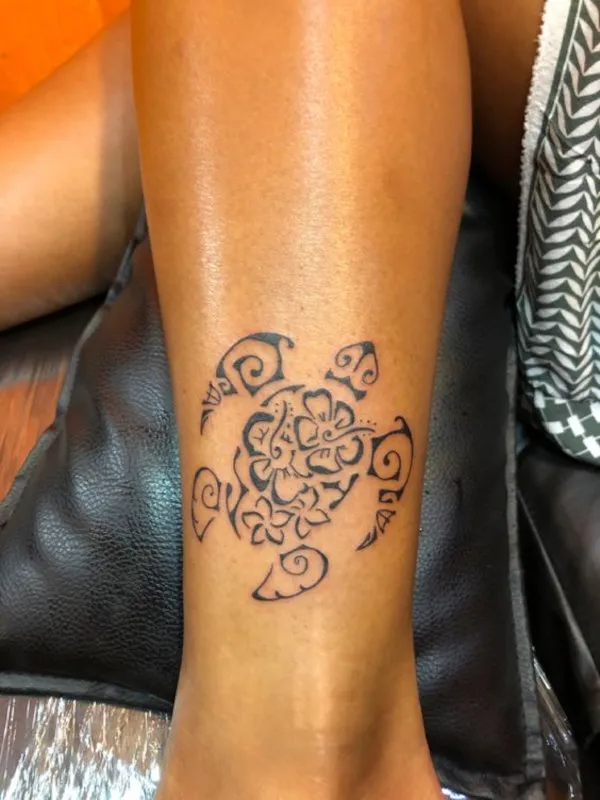 Real community tattoo placement: Guest - flowers turtle