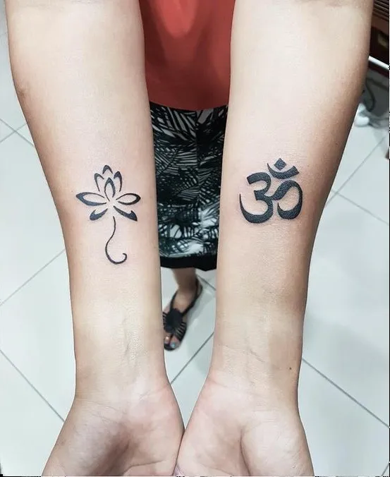 Real community tattoo placement: Guest - lotus & aum