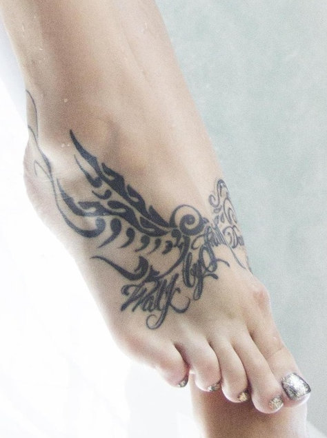 Gypsyy Swallow tattoo on foot detail