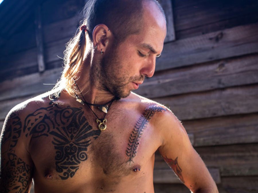 Polynesian Africa and Filipino centipede tribal tattoos: inked placement real user tattoo photo
