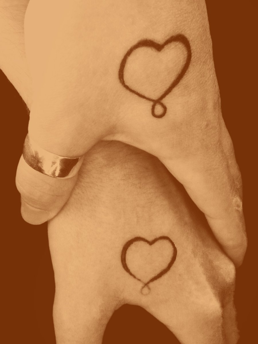 Guest photo of infinity heart tattoo used as couples tattoo: inked placement real user tattoo photo