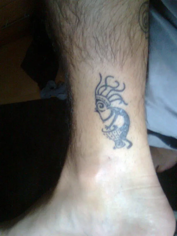 Real community tattoo placement: Kokopelliguy - Rasta kokopelli
