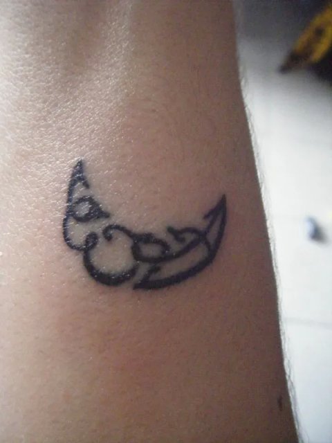 Adriana - E+A moon slice: real inked placement tattoo photo thumbnail