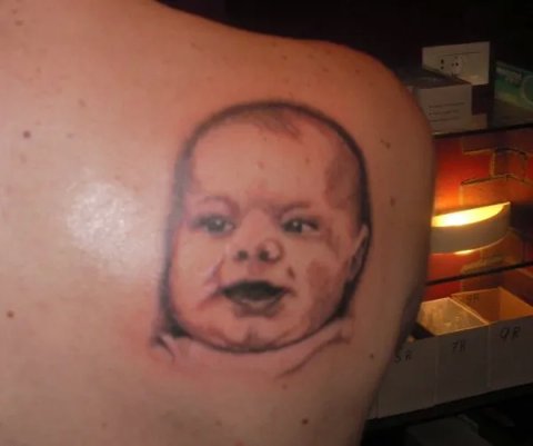 Evil Zone - Baby portrait: real inked placement tattoo photo thumbnail