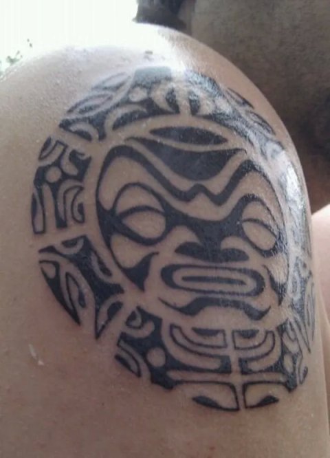Kris - Polynesian sun: real inked placement tattoo photo thumbnail