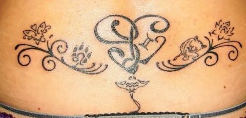 Sara - SL heart lowerback: real inked placement tattoo photo thumbnail