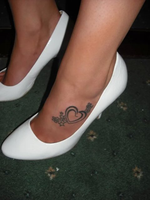 Shauna - Concentric hearts: real inked placement tattoo photo thumbnail